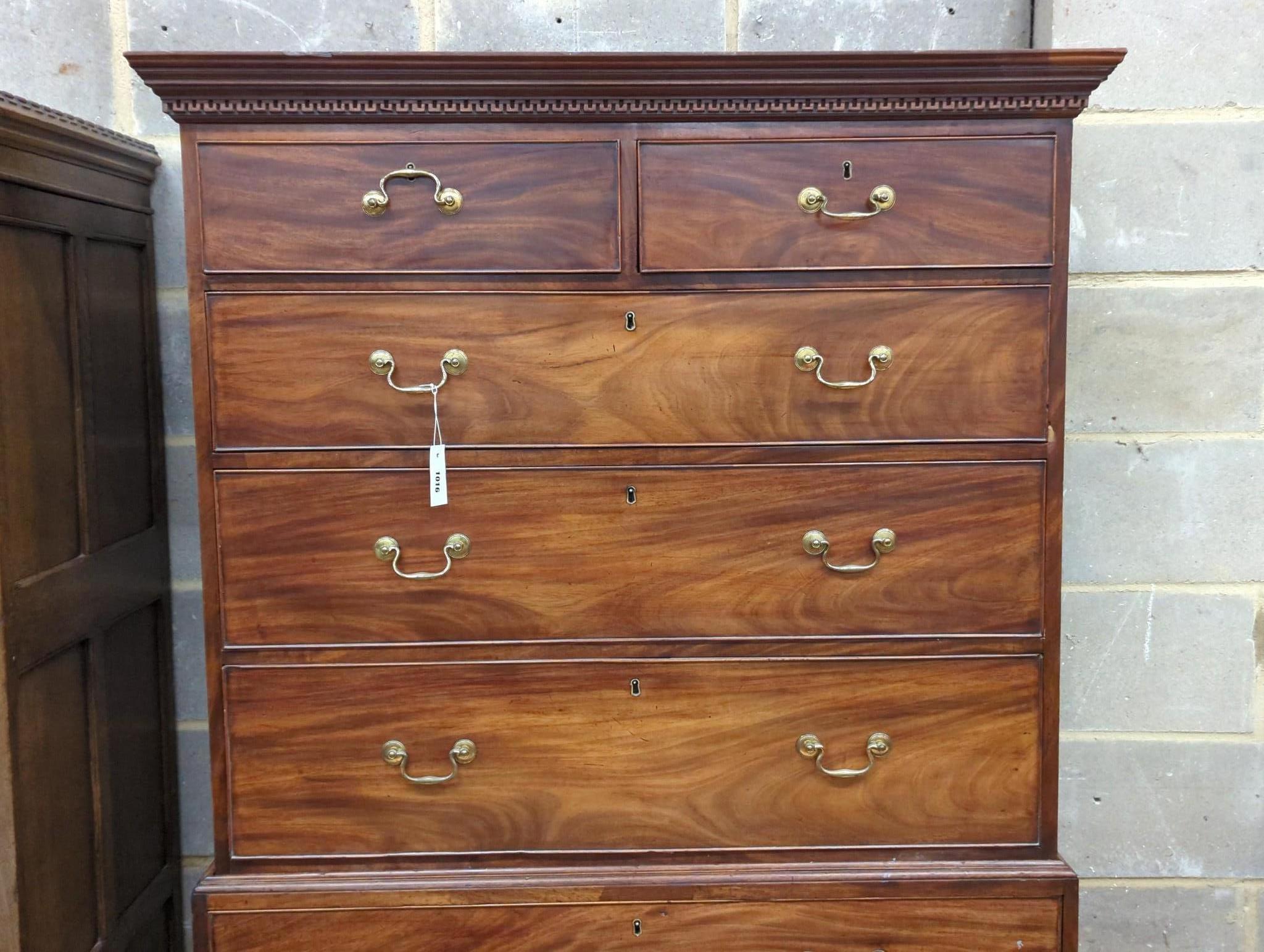 A George III mahogany chest on chest, width 111cm, depth 55cm, height 184cm